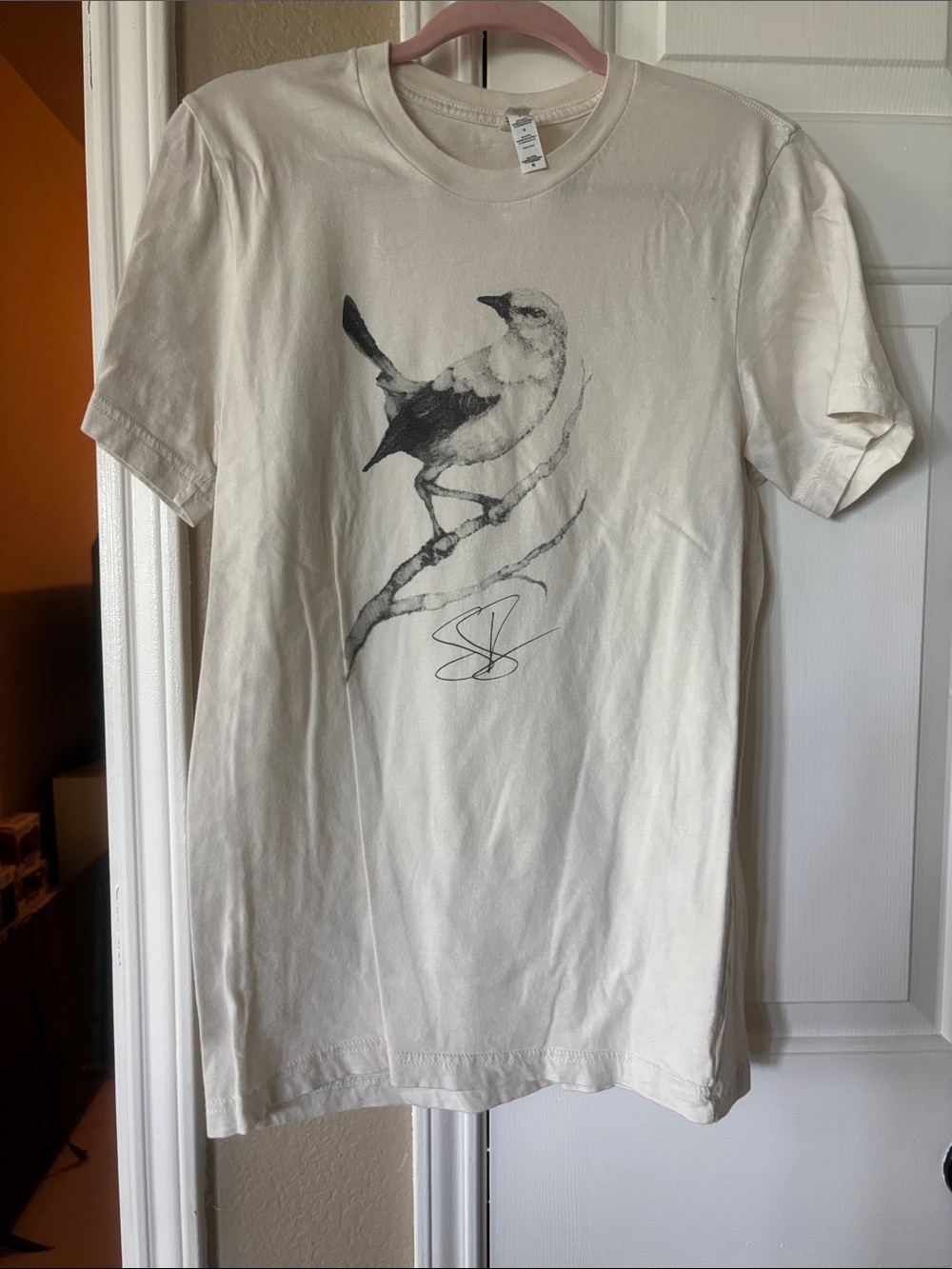 Bella Canvas Cream Short Sleeve Tee with Black Bird Print